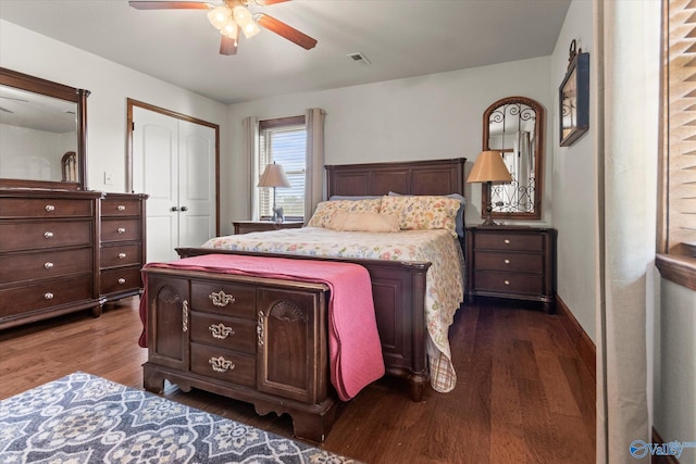 1707 Byron Rd, Scottsboro, AL 35769 - bedroom with dark wood-style flooring, a closet, and a ceiling fan