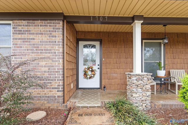 1707 Byron Rd, Scottsboro, AL 35769 - view of exterior entry with a porch