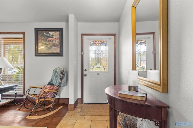 1707 Byron Rd, Scottsboro, AL 35769 - foyer entrance with baseboards and light tile patterned flooring