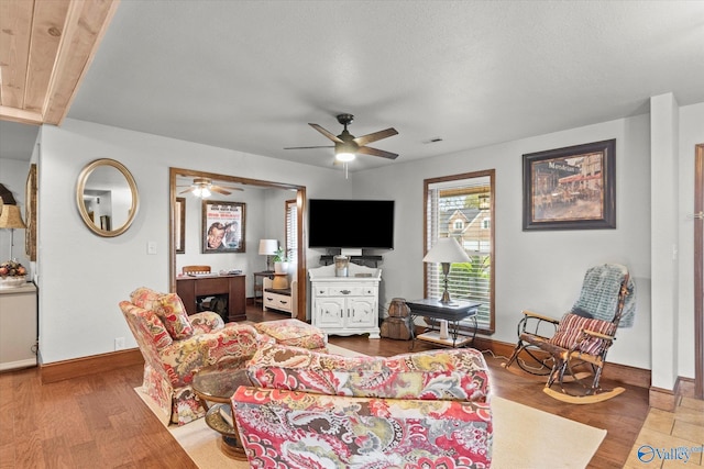 1707 Byron Rd, Scottsboro, AL 35769 - living room featuring a ceiling fan and wood finished floors