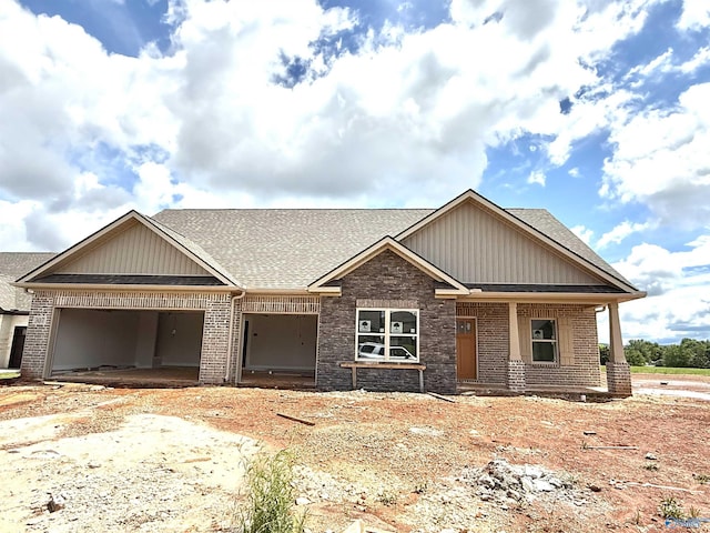 305 Wanto Ln, Huntsville, AL 35811 - craftsman inspired home featuring roof with shingles, brick siding, and a garage