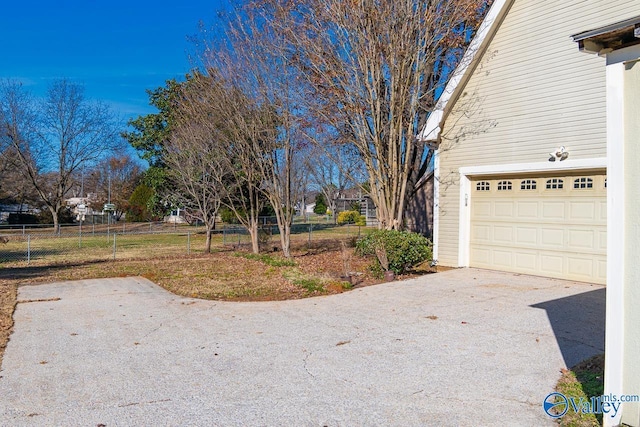 view of yard featuring a garage