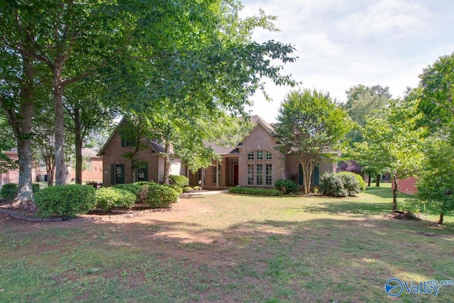 112 Vaughnwood Trce, Huntsville, AL 35806 - view of front of property featuring brick siding and a front yard