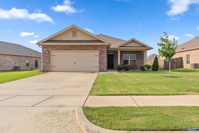 107 Sunlit Grove Dr, Harvest, AL 35749 - view of front of home featuring brick siding, a garage, concrete driveway, and a front lawn