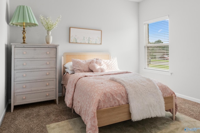 107 Sunlit Grove Dr, Harvest, AL 35749 - bedroom with dark colored carpet and baseboards