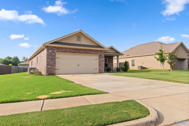107 Sunlit Grove Dr, Harvest, AL 35749 - view of front of house with brick siding, a garage, and driveway
