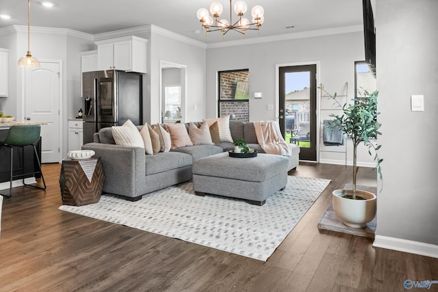 107 Sunlit Grove Dr, Harvest, AL 35749 - living area with plenty of natural light, a chandelier, recessed lighting, dark wood-type flooring, and crown molding