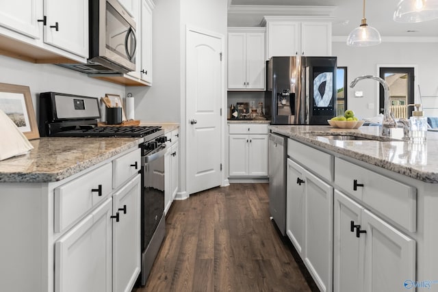 107 Sunlit Grove Dr, Harvest, AL 35749 - kitchen with appliances with stainless steel finishes, dark wood-style floors, white cabinets, crown molding, and decorative light fixtures