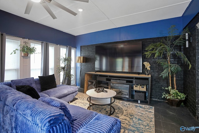 tiled living area featuring ceiling fan