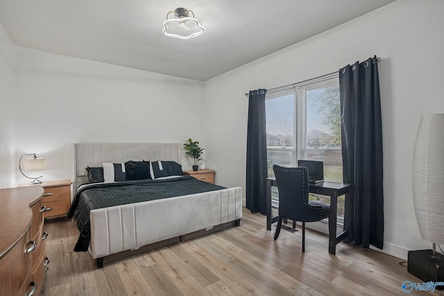 bedroom with light wood-style flooring