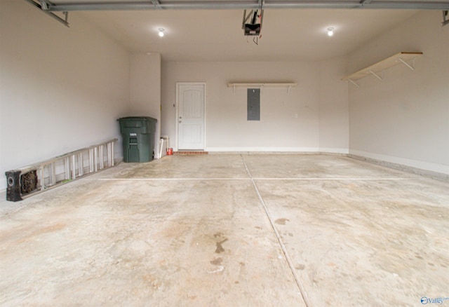 garage featuring a garage door opener and electric panel