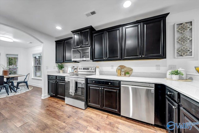 kitchen featuring light wood-type flooring and stainless steel appliances