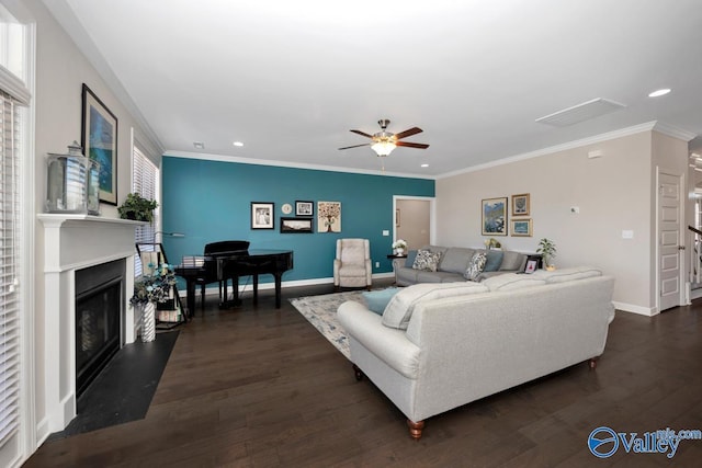 living area with dark wood-style floors and ornamental molding