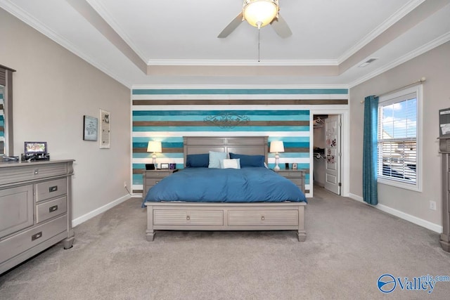 bedroom featuring carpet flooring, a ceiling fan, baseboards, and ornamental molding