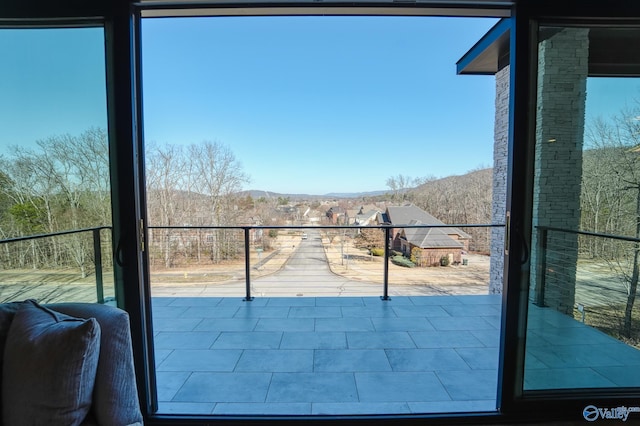 balcony featuring a mountain view