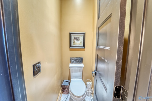 bathroom featuring toilet