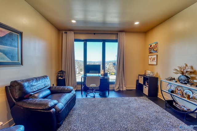 sitting room with recessed lighting, baseboards, and wood finished floors