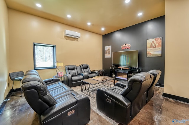 cinema with baseboards, recessed lighting, a wall mounted air conditioner, and finished concrete floors