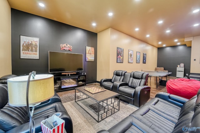 cinema room with recessed lighting and baseboards