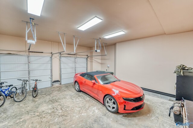 garage featuring a garage door opener