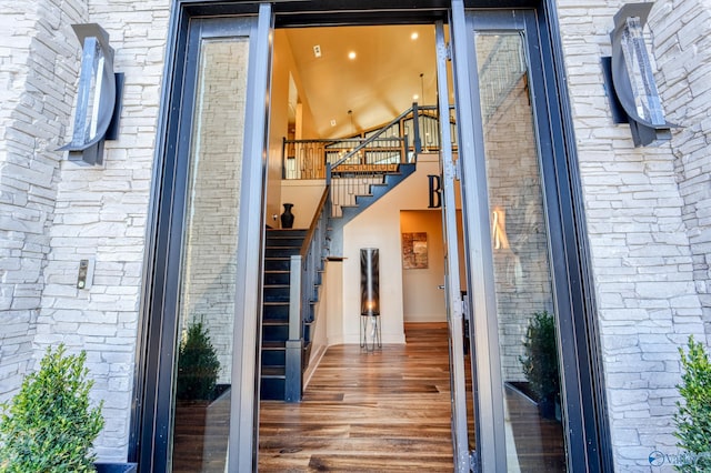 view of exterior entry with brick siding