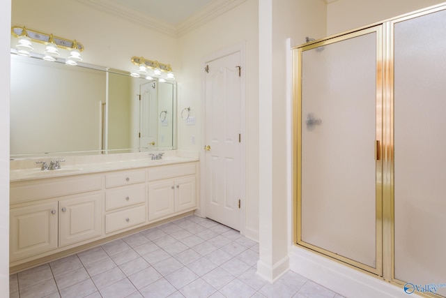 bathroom featuring tile patterned floors, vanity, an enclosed shower, and crown molding