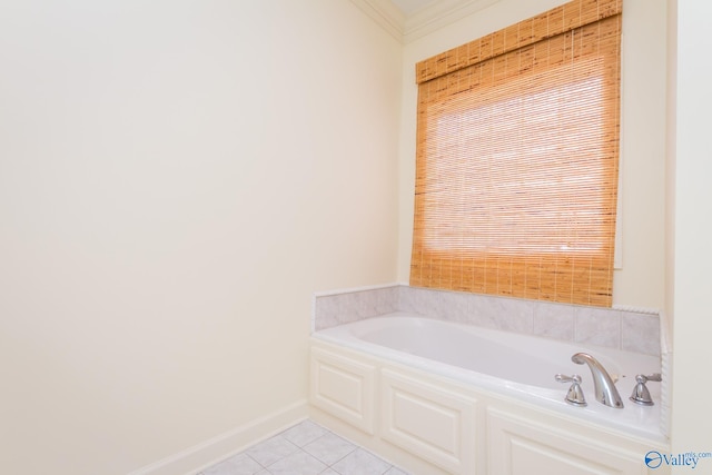 bathroom with a bath, tile patterned floors, and ornamental molding