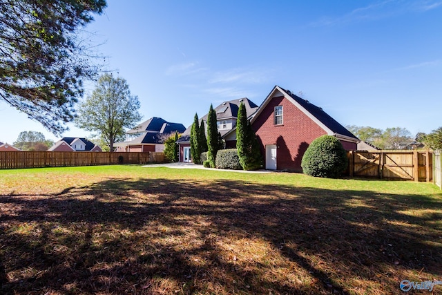 view of property exterior featuring a yard