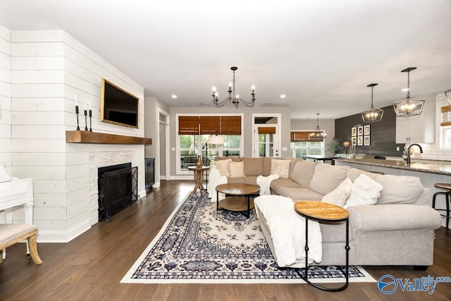 12 Cobbs Cove Way SE, Huntsville, AL 35803 - living room featuring a chandelier, dark wood-type flooring, plenty of natural light, and recessed lighting