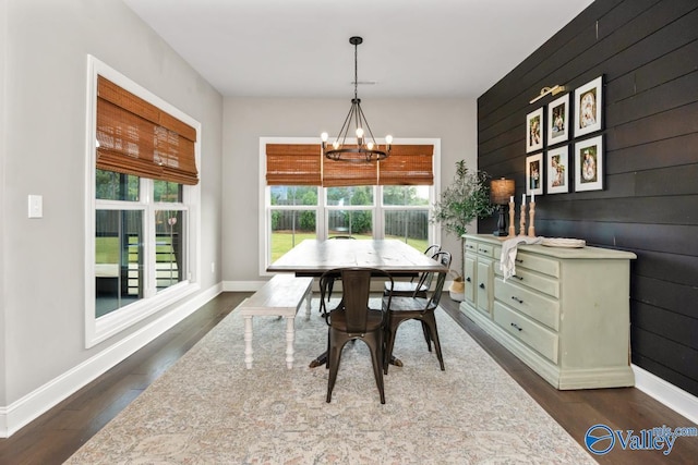 12 Cobbs Cove Way SE, Huntsville, AL 35803 - dining space featuring healthy amount of natural light, a chandelier, dark wood-style floors, and baseboards