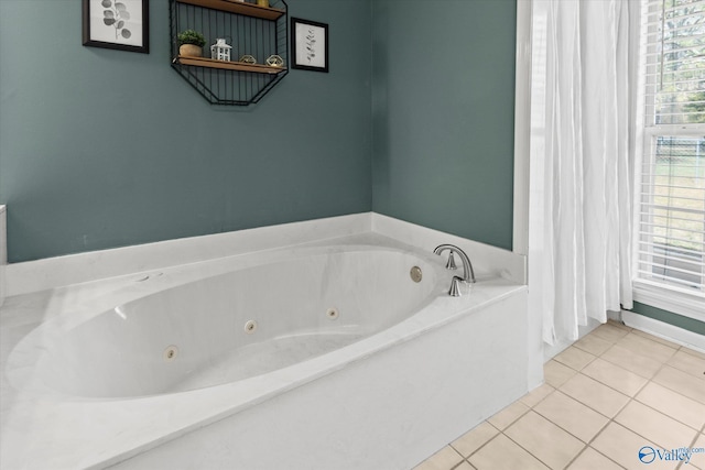 bathroom featuring tile patterned floors and a bathing tub