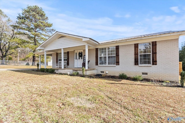 single story home with a front yard and a porch