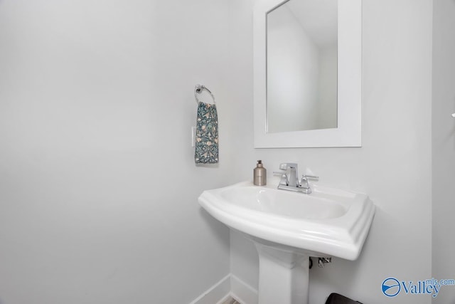 bathroom with baseboards