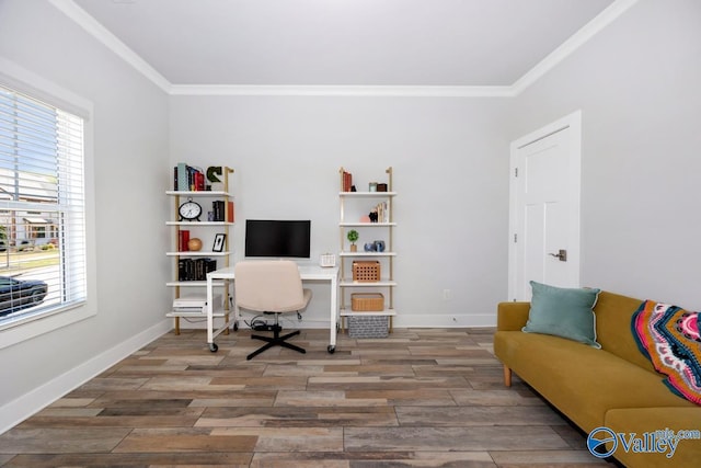 office featuring crown molding, wood finished floors, and baseboards