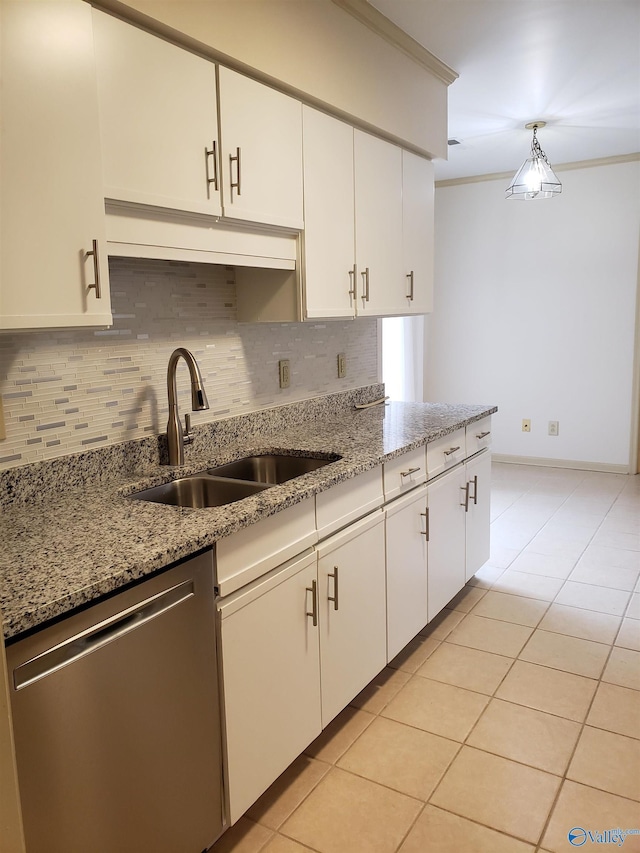 kitchen featuring stainless steel dishwasher, white cabinets, ornamental molding, and sink