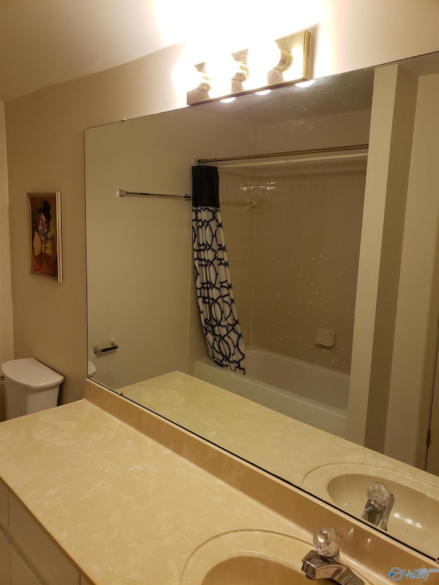 bathroom with vanity and shower / tub combo