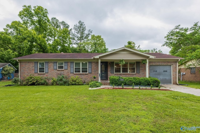 1108 Danmann Dr SE, Huntsville, AL 35803 - ranch-style house featuring an attached garage, driveway, brick siding, and a front yard