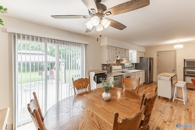 1108 Danmann Dr SE, Huntsville, AL 35803 - dining room featuring light wood-type flooring and a ceiling fan