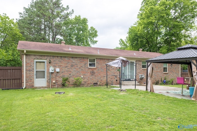 1108 Danmann Dr SE, Huntsville, AL 35803 - back of house featuring a gazebo, a patio, and brick siding