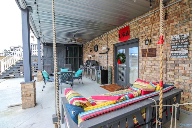 view of patio with an outdoor living space, ceiling fan, and french doors