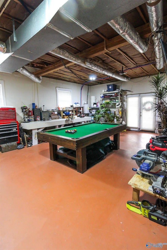 playroom with a healthy amount of sunlight, billiards, and concrete floors