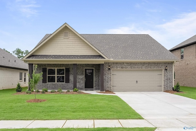 craftsman-style home featuring a garage and a front yard