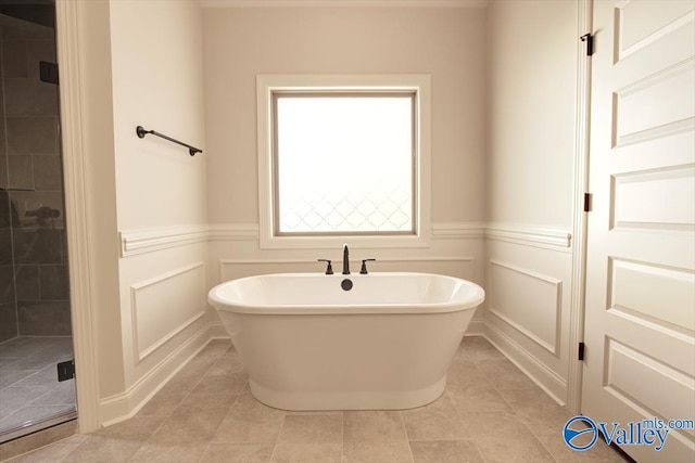 bathroom with tile patterned floors and plus walk in shower