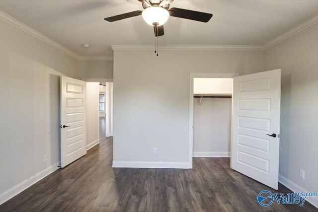 unfurnished bedroom featuring a closet, ornamental molding, dark hardwood / wood-style floors, and ceiling fan