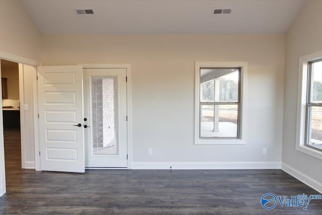 entryway with dark wood-type flooring