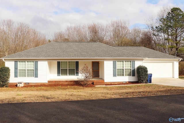 ranch-style house featuring a garage