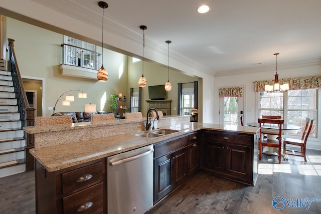 kitchen with dark wood-style flooring, crown molding, dark brown cabinetry, a sink, and dishwasher