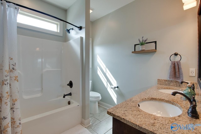 full bathroom featuring shower / tub combo, tile patterned flooring, a sink, and toilet