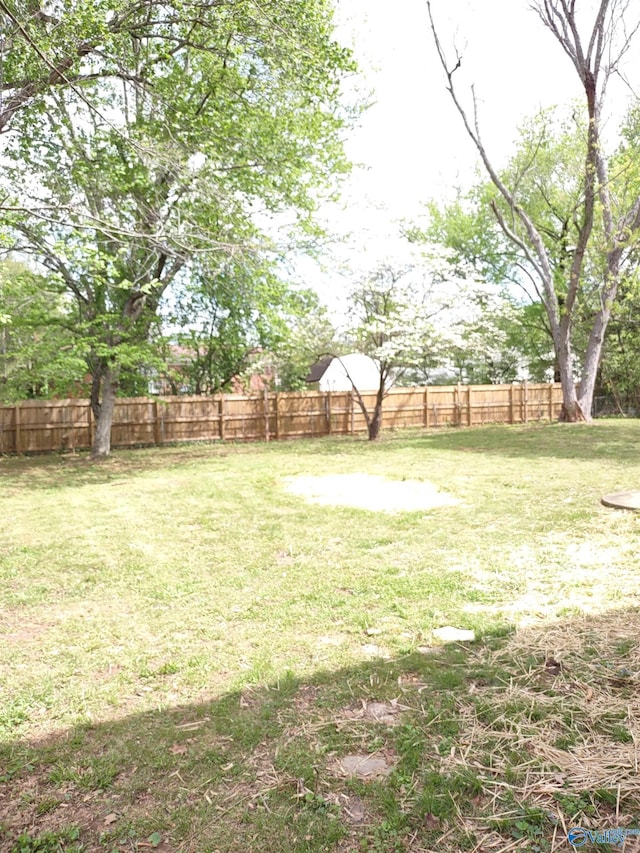 view of yard with fence