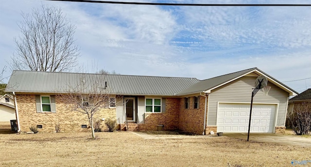 single story home featuring a garage